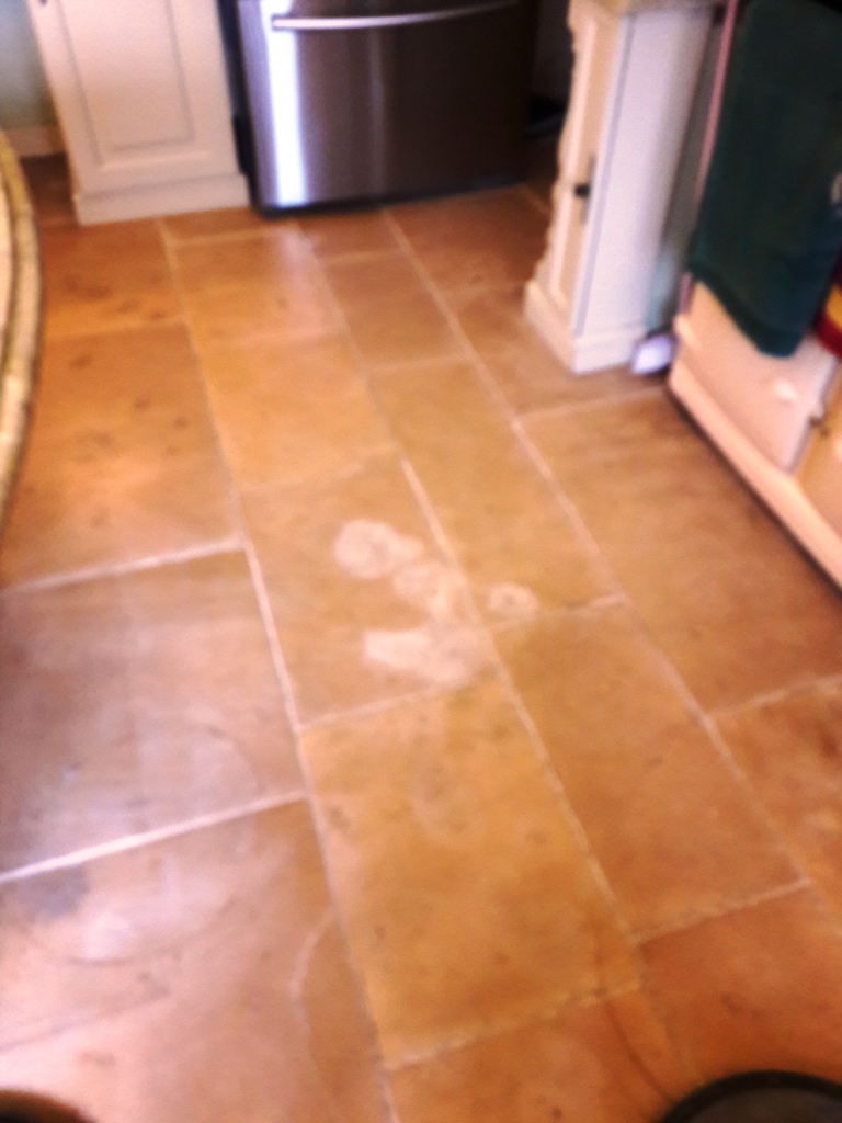 Limestone Tiled Kitchen Floor in Tutbury Before Stain Removal